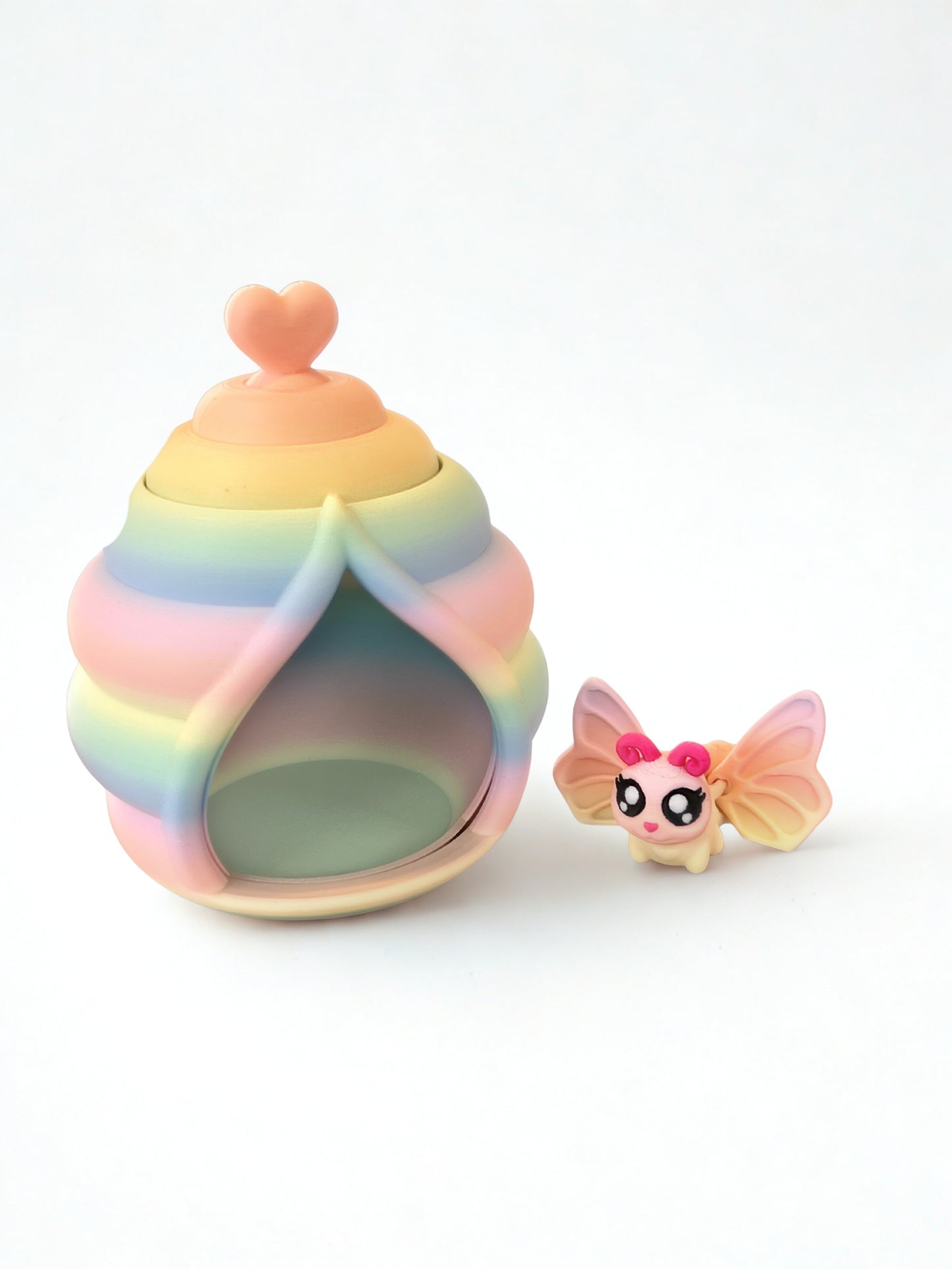 Mini butterfly toy and butterfly house with revolving door.