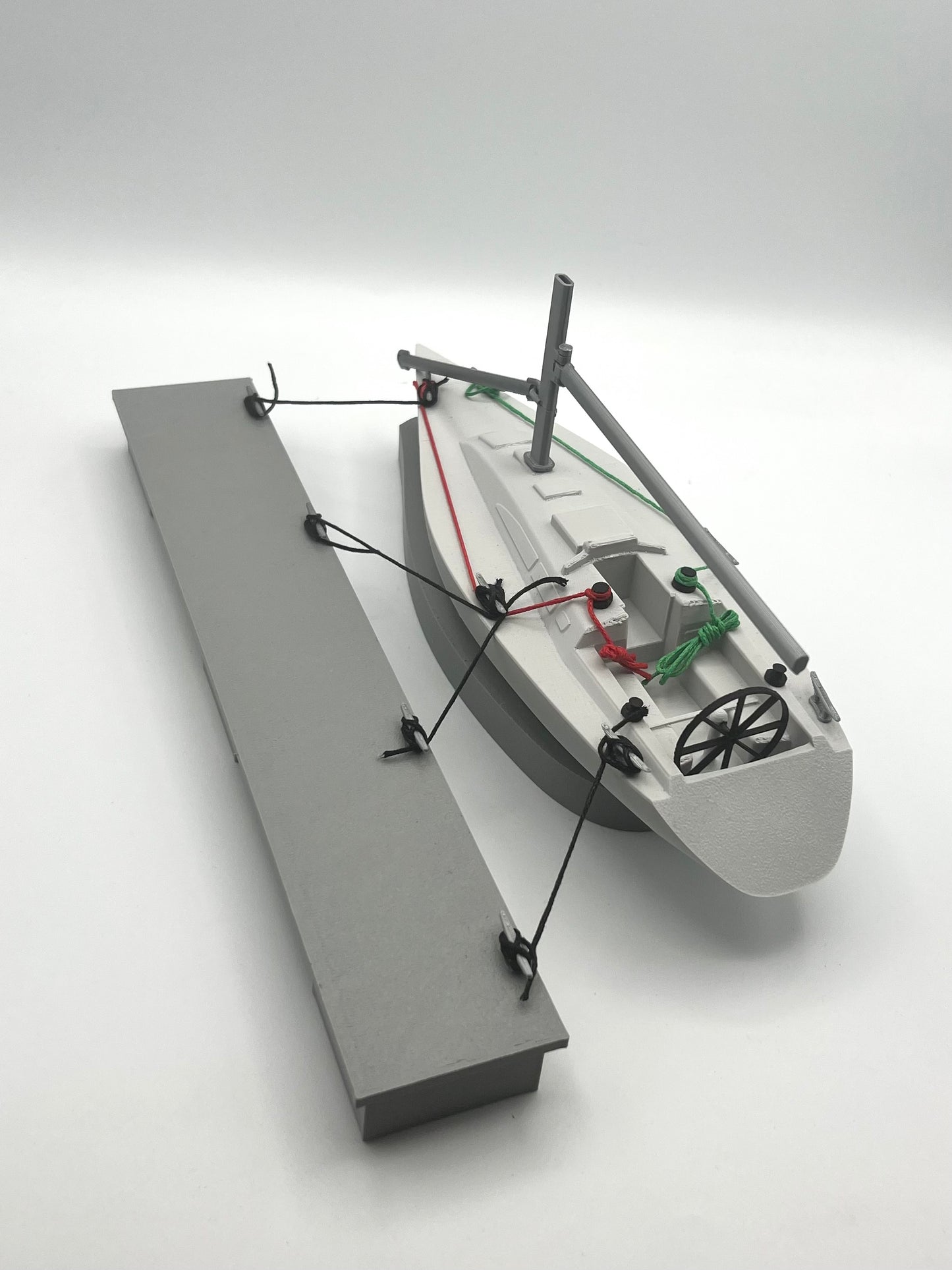 Yacht with pontoon, Sailing training aid with cleats and lines.