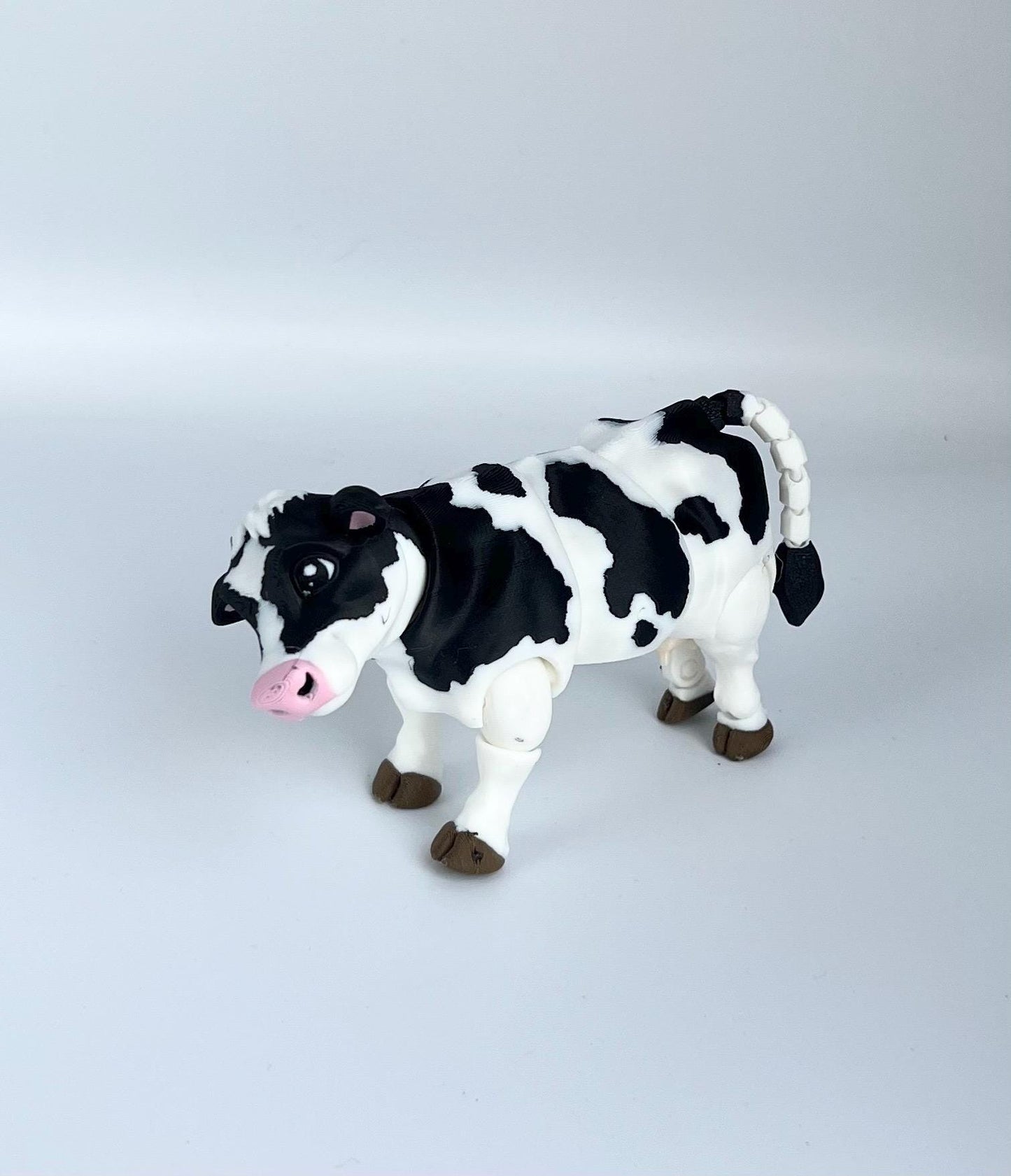 Articulated Cow Fidget Toy: Black & White Farm Animal Desk Decor