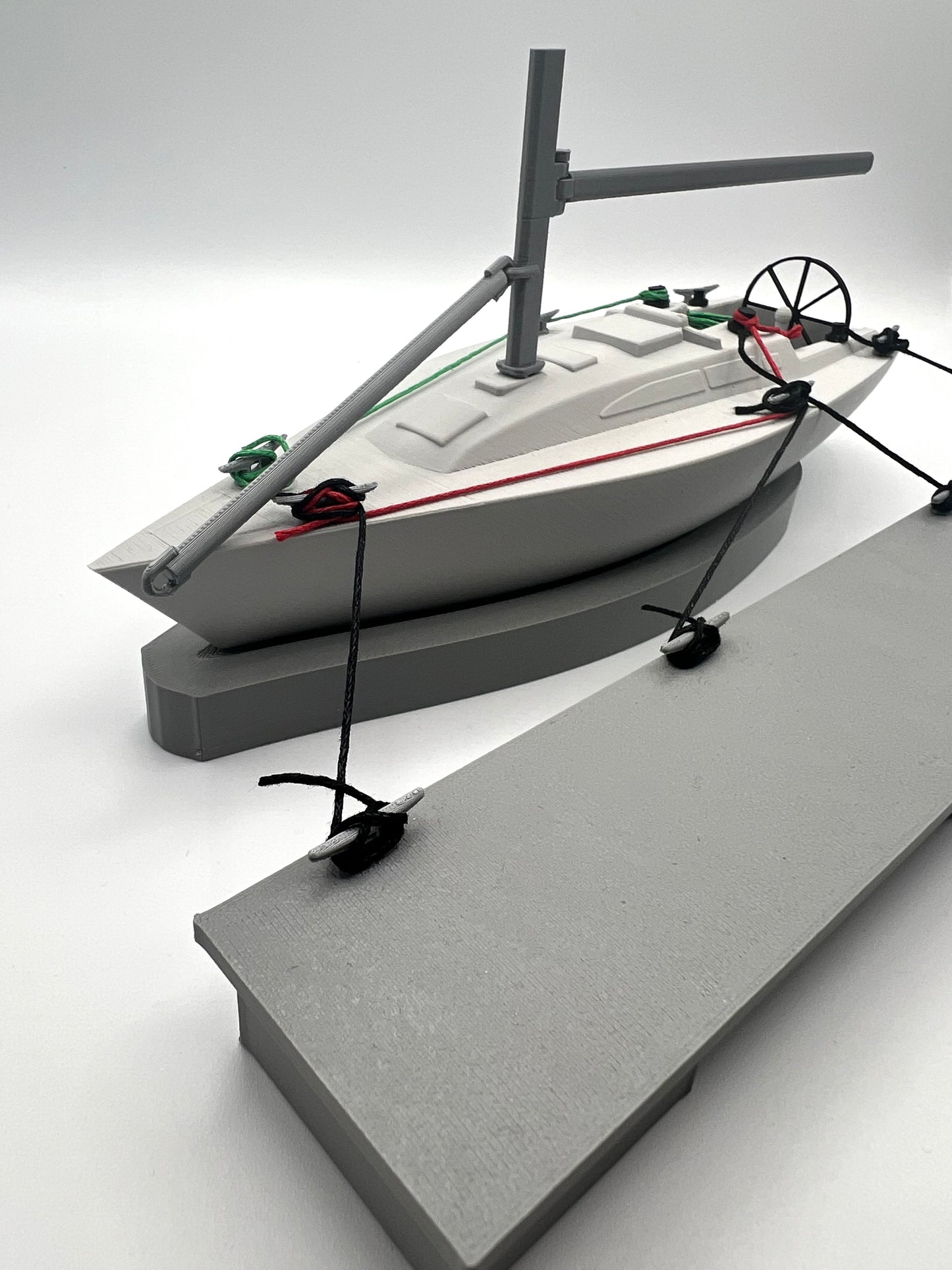Yacht with pontoon, Sailing training aid with cleats and lines.