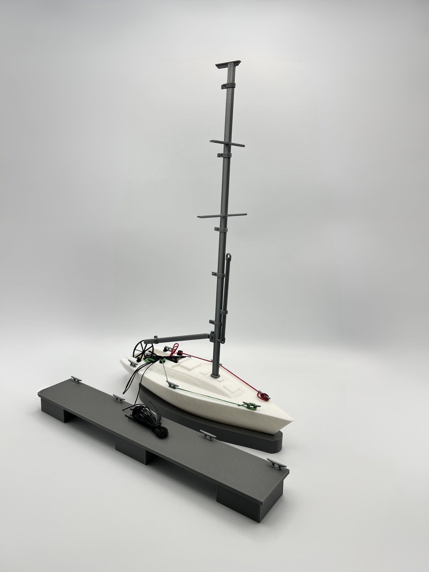 Sail training aid. Yacht with pontoon, cleats and lines. Now with removeable weighted keel and Sails options!