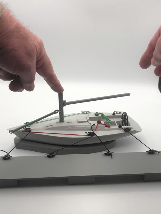 Yacht with pontoon, Sailing training aid with cleats and lines.